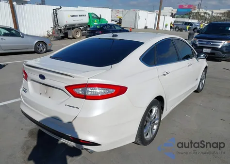 2015 Ford Fusion Energi Titanium from USA, damaged, VIN 3FA6P0SU2FR280928